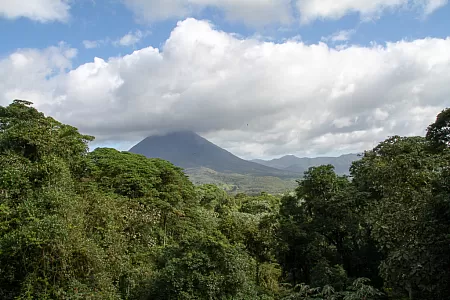 Arenal volcano partially hidden by clouds